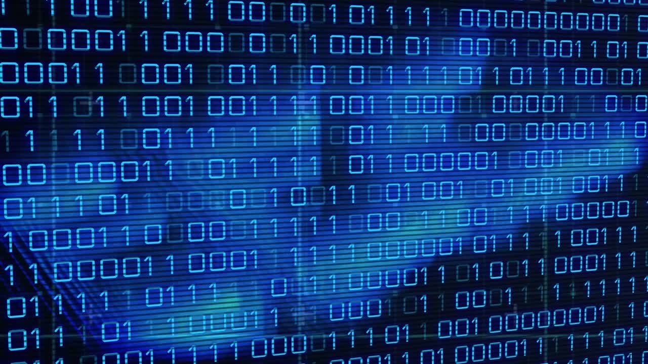 Animation of binary code over blue lines on black background
