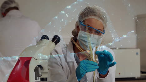 animación de cadena de adn y procesamiento de datos sobre una científica biracial en el laboratorio