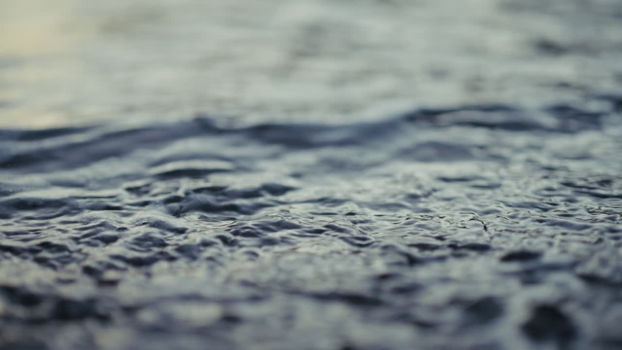 Sea Waves Calmly Moving On The Shores. Rack Focus Shot