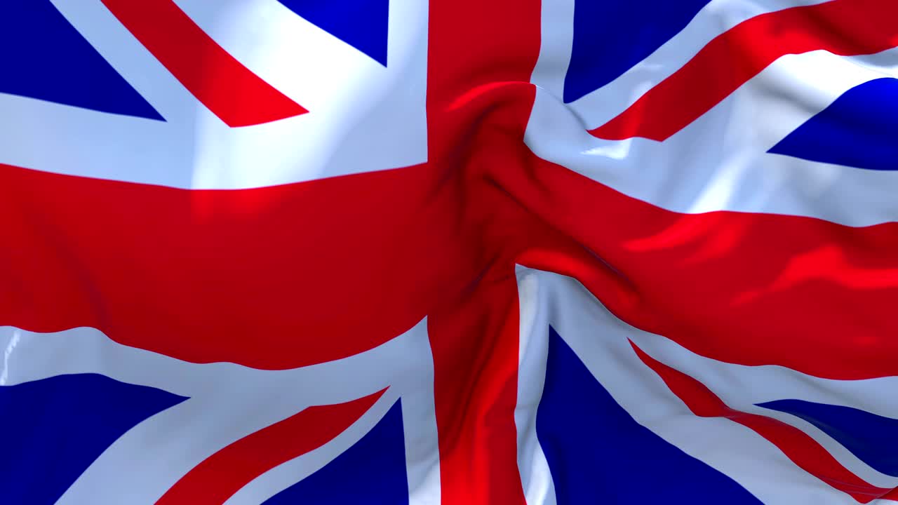 United Kigdom Flag Waving in Wind Slow Motion Animation . 4K Realistic Fabric Texture Flag Smooth Blowing on a windy day Continuous Seamless Loop Background.