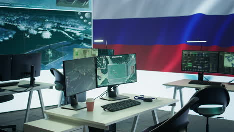 empty russian army command center with a big screen showing the national flag