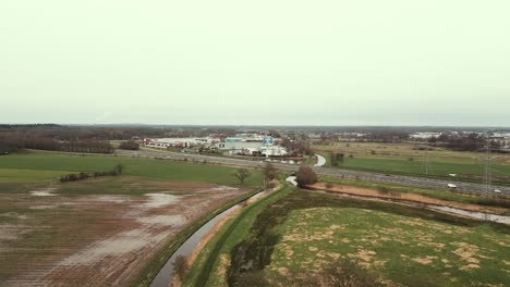 dutch countryside aerial view with highway and shopping center