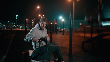 man at night outdoor gym