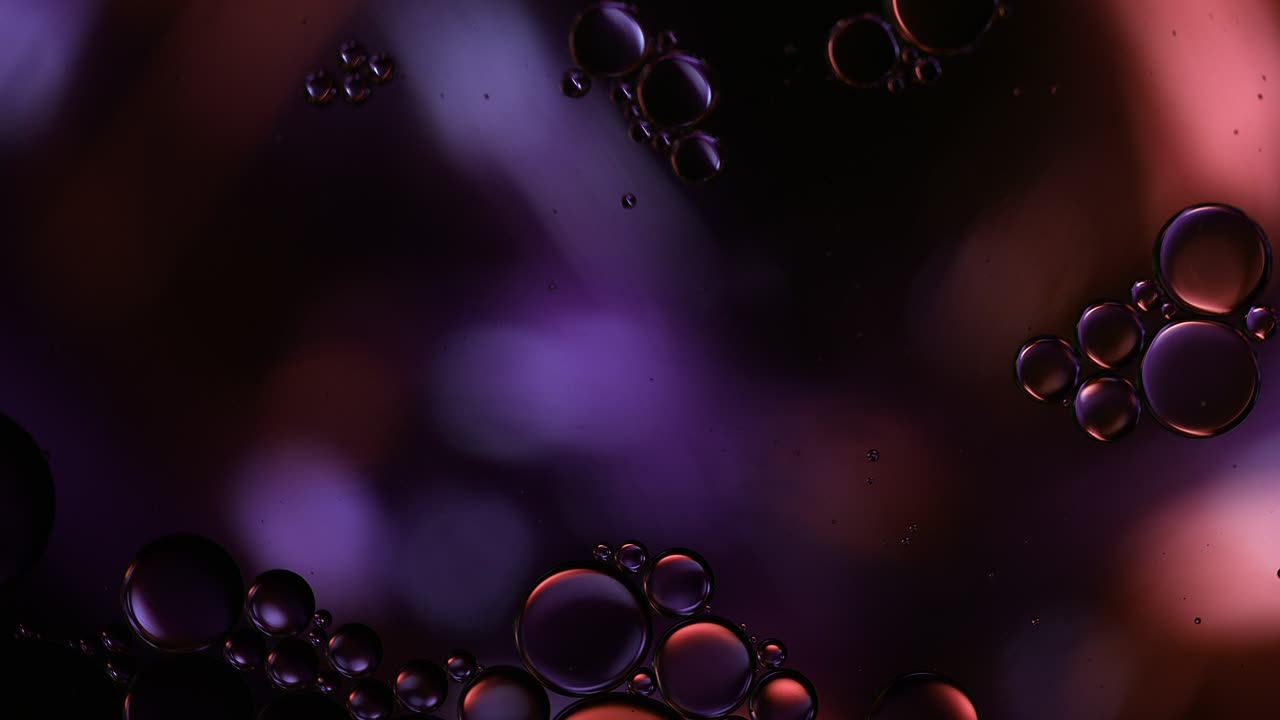 Abstract Colorful Food Oil Drops Bubbles and spheres Flowing