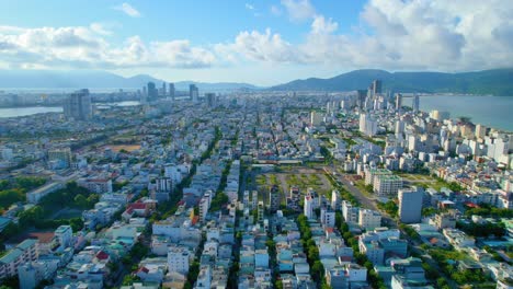 aerial establishing shot urban vietnamese cityscape son tra, da nang, vietnam