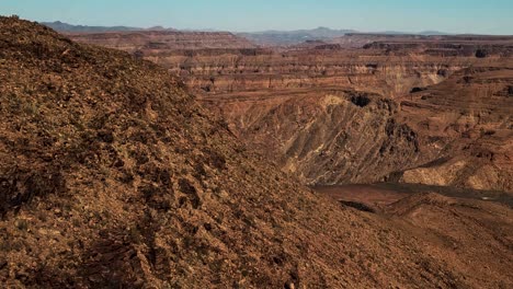 Fish-River-Canyon-in-Namibia,-Africa-Aerial-Drone-Shot