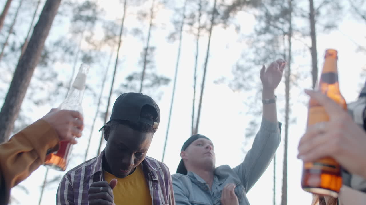 Friends enjoying a party in the forest