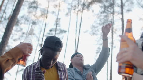friends enjoying a party in the forest
