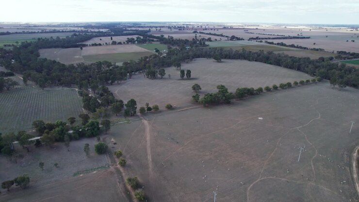 Aerial view of the agricultural lanscape and the winduing Loddon River south of Bridgewater in central Victoria, Australia, May 2025.