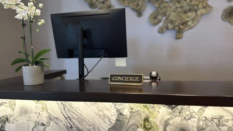 Hotel-Concierge-Desk.-Slow-Zoom-In-Left