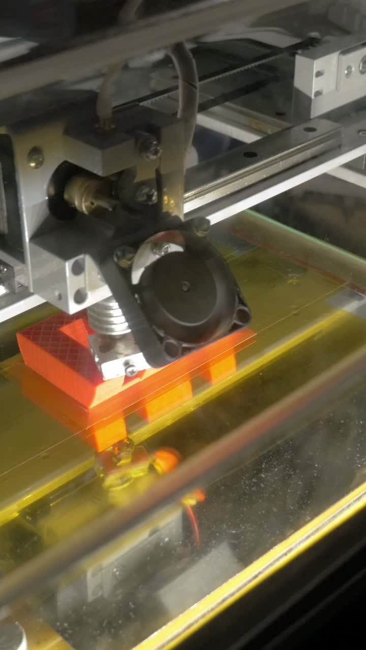 3D Printer Printing an Object