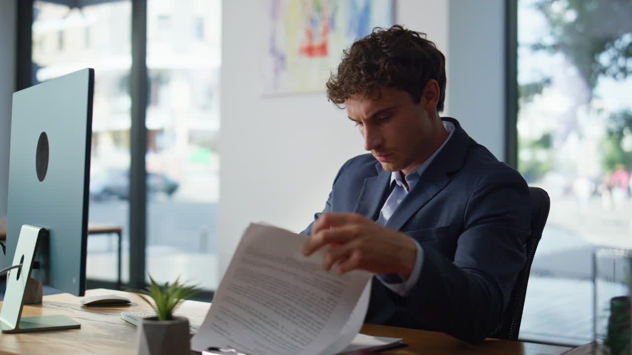 Serious ceo checking report at computer workplace closeup. Accountant working