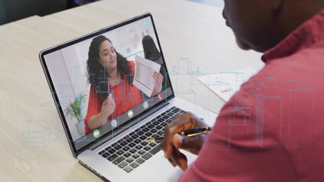 senior man holding pen at wood table, reviewing laptop in business meeting with blueprint overlays