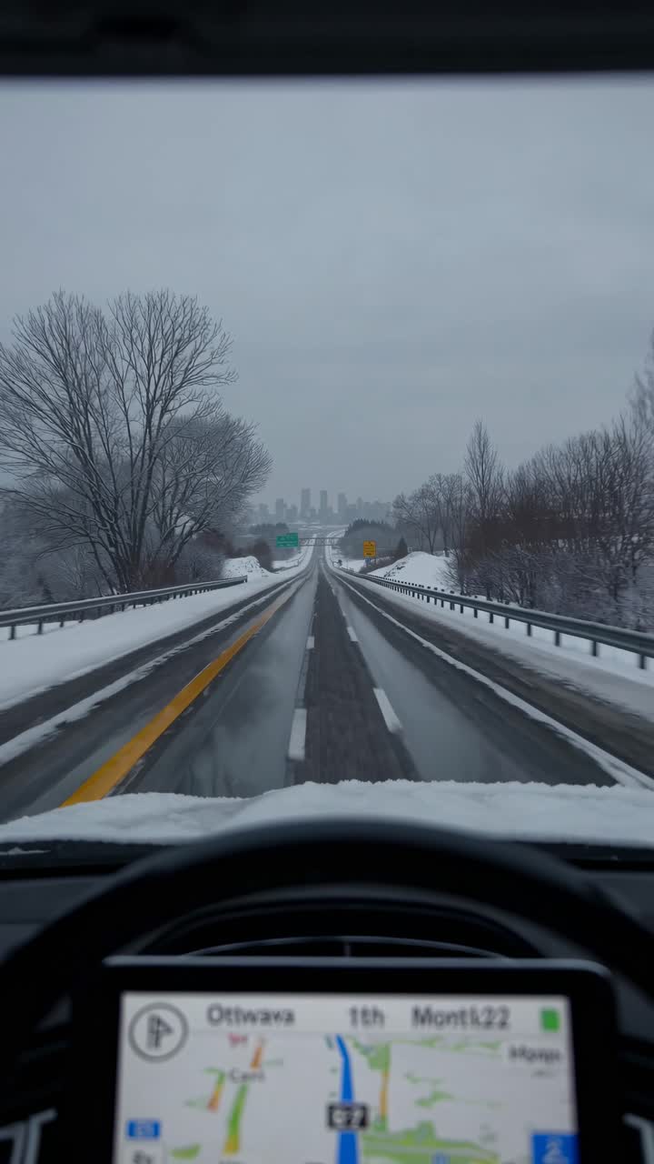 POV video style capturing a snowy highway from a driver's perspective, showcasing a serene winter