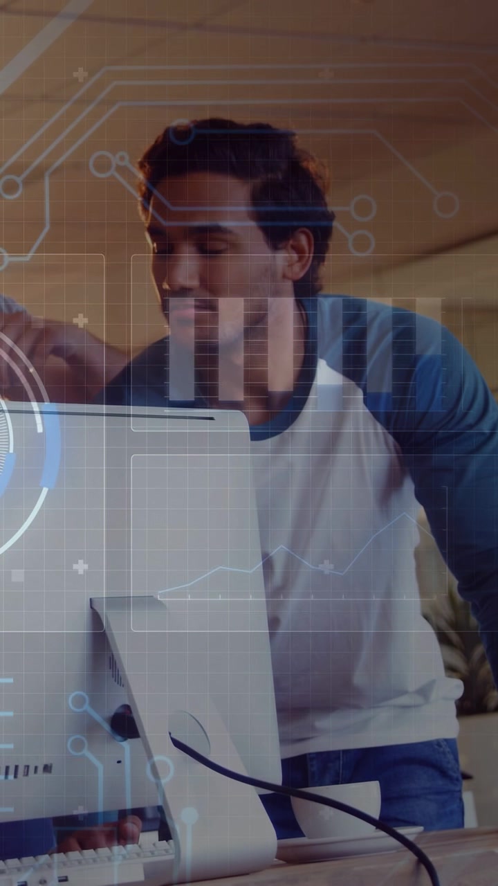 Vertical video: Man leaning at PC reaching screen as arm tapping shoulder starting tech HUD review