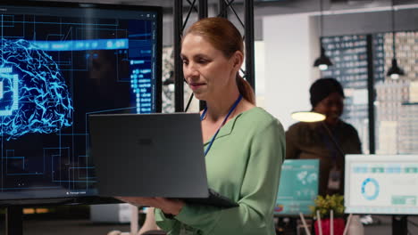 vertical video female entrepreneur works with neural networks for analytics