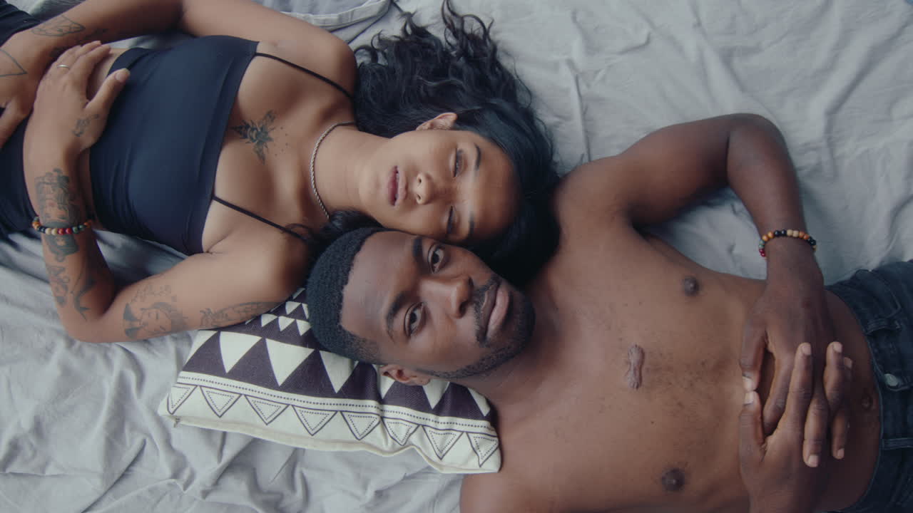Top Down Shot of a Couple on Bed