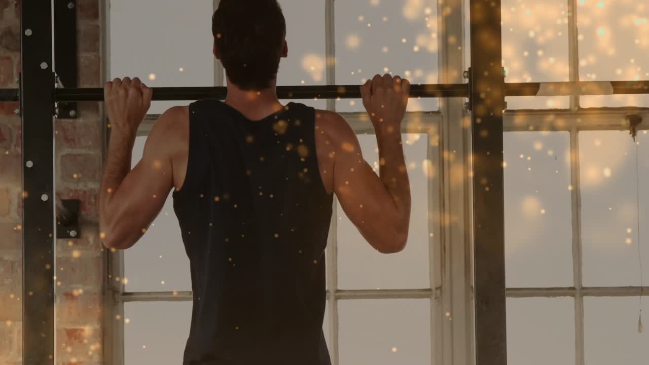 Man gripping pull-up bar and pulling up in loft windows, bokeh highlighting strength for fitness
