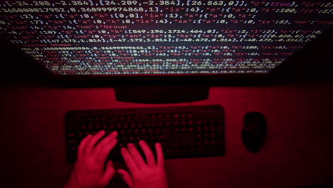 person coding at night