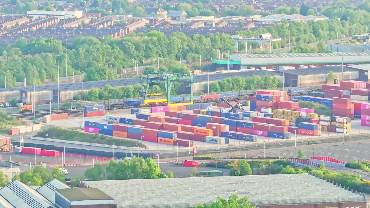 Aerial View Of Stacked Shipping Containers In The Distance, Shipping Port In Industrial Area, Manchester UK