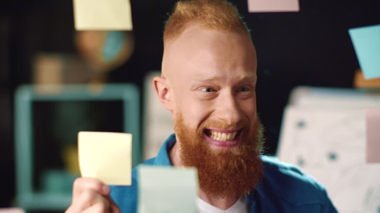 Winner businessman finding good idea on board. Guy feeling happy at office