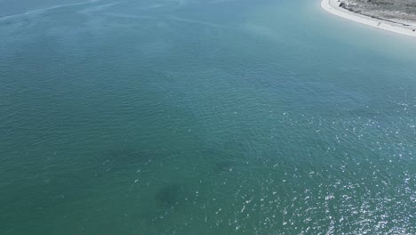 Aerial-view-of-the-Atlantic-Ocean-on-a-paradise-beach-on-a-beautiful-sunny-day