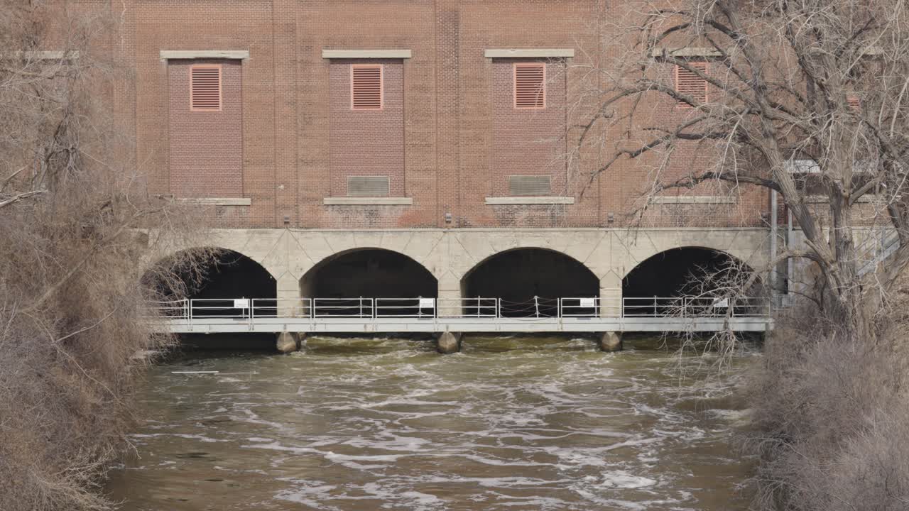 River Water Flowing At Hennepin Island Hydroelectric Plant - St. Anthony Falls In Minneapolis, Minnesota. slow motion, static shot