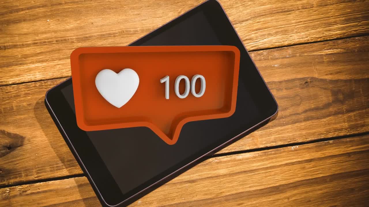 Tablet, kalp simgesi ve sosyal medya sayıları içeren bir mesaj balonu