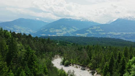 drone flies downwards over dried up river