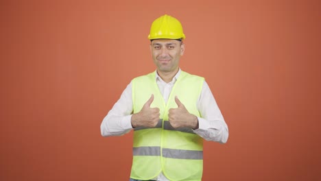 The-engineer-wearing-a-hard-hat-and-smiling.