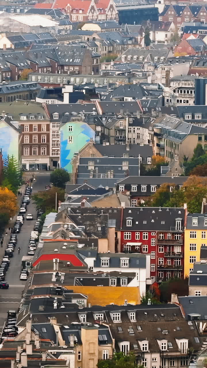 Aerial drone view of Vesterbro district in Copenhagen, Denmark in daylight. Vertical
