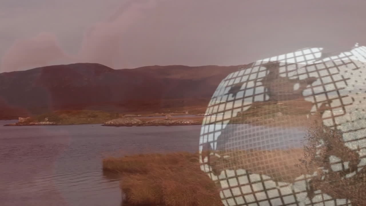 Animation of grid pattern overlaying serene lake and mountain landscape at dusk