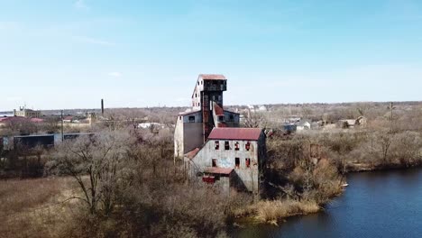 aerial of an abandoned mill factory in illinois suggests the decay of america's manufacturing era