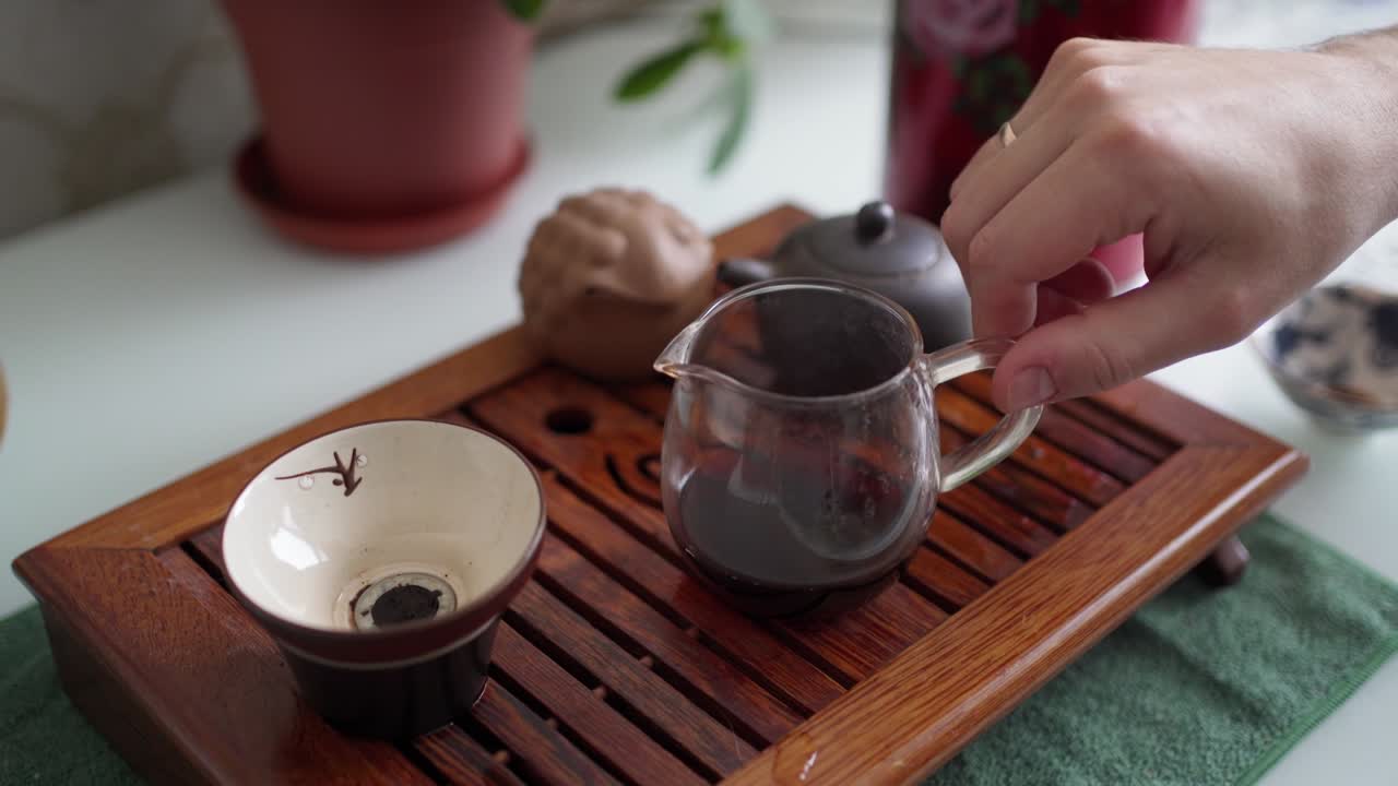 portable table for the tea ceremony. tea in a teapot, a bowl and a special funnel for tea
