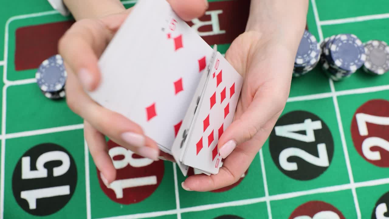 Playing Cards and Casino Chips on Roulette Table