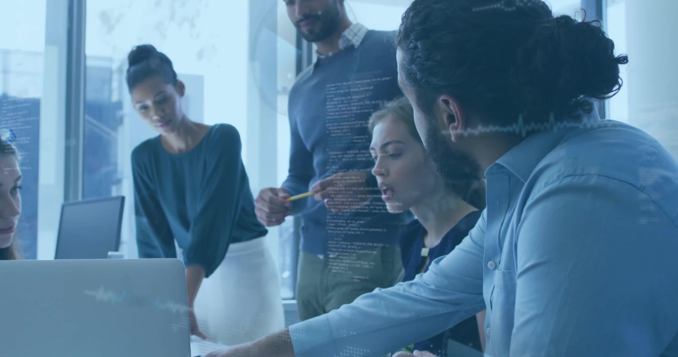 Diverse Professional Team Collaborating on Project in Modern Office