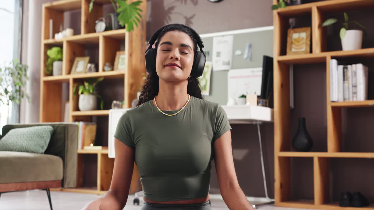 Woman Meditating with Headphones at Home