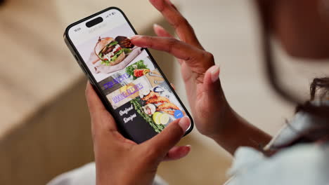 using a food recipe app on a smartphone