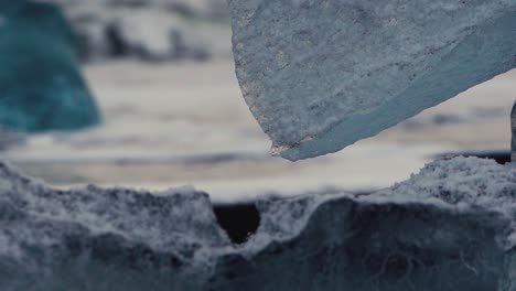 slow motion shots of blue icebergs on diamond beach in iceland