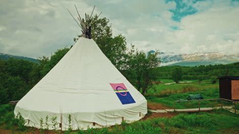 outdoor view of a indigenous sami tent in norway.