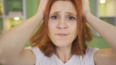 frustrated young woman. the woman who got angry with what she saw on the laptop.