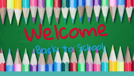 Welcome-back-to-school-text-against-colored-pencils-on-green-background