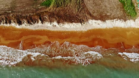 Vibrant-Color-Of-Clay-Therapeutic-Beach-Of-Megas-Lakkos-In-Kefalonia-Greece--aerial-shot