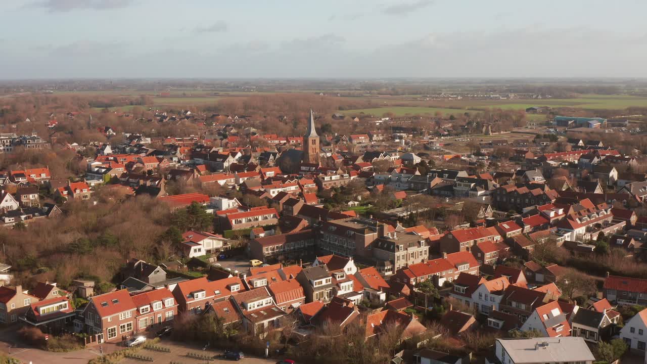 Aerial view of a Dutch town located next to the sea