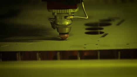 CNC-Laser-cutting-of-metal-in-slow-motion,-modern-industrial-technology.