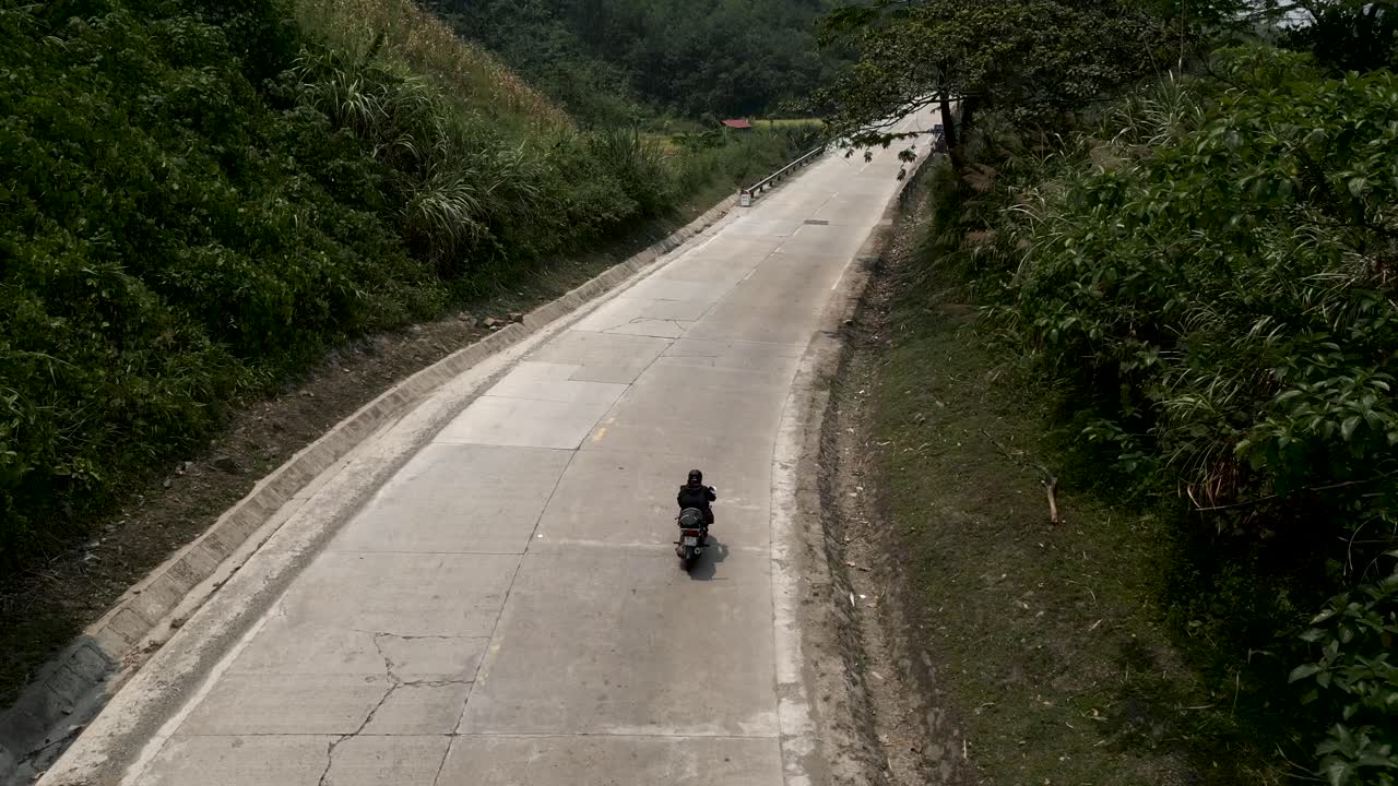 Motorcycle on Winding Mountain Road