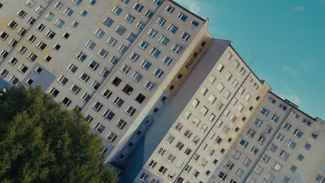 multi-story apartment building with mural details