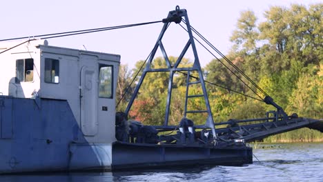 Industrial-barge-float-on-river-in-slow-motion.-Industrial-vessel.-Water-cargo