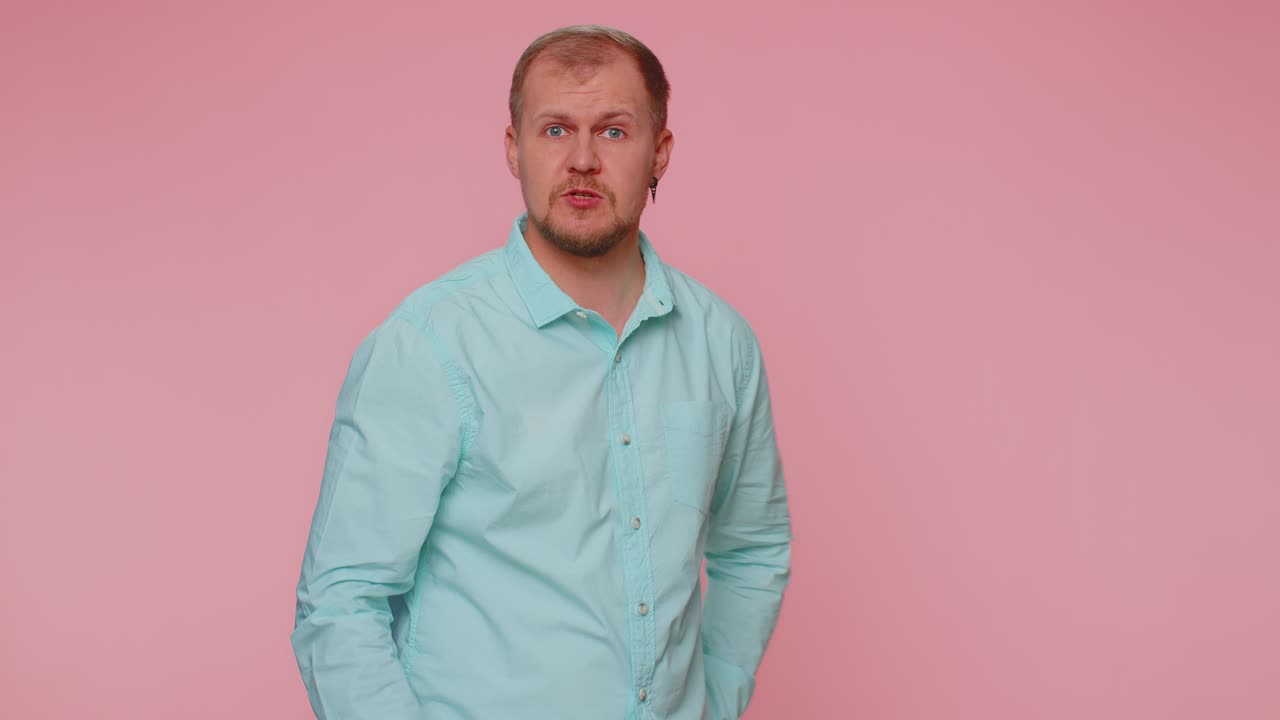 Displeased man gesturing hands with irritation displeasure blaming scolding for failure asking why