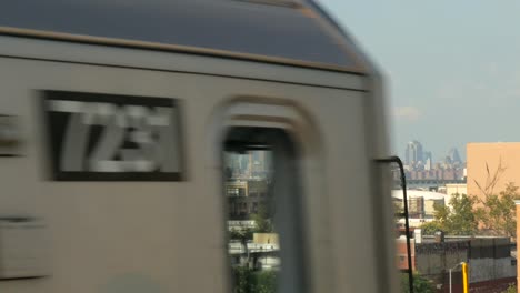 Fast-Train-Moving-Past-New-York-Skyline